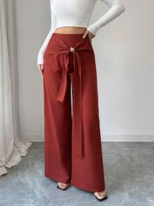 Elenzga Pantalones casuales versátiles de estilo bohemio occidental de cintura alta en color marrón óxido, con diseño de tejido trenzado, hebilla metálica cruzada asimétrica, cremallera lateral y pierna recta, adecuados para mujeres de 20 a 35+ años para uso diario, primavera y otoño - Óxido marrón - Ver 3