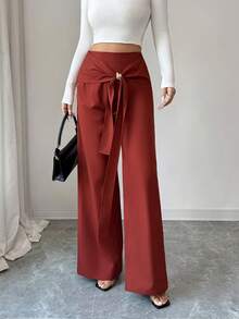 Elenzga Pantalones casuales versátiles de estilo bohemio occidental de cintura alta en color marrón óxido, con diseño de tejido trenzado, hebilla metálica cruzada asimétrica, cremallera lateral y pierna recta, adecuados para mujeres de 20 a 35+ años para uso diario, primavera y otoño - Óxido marrón - Ver 5