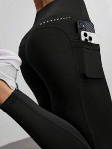 Pantalones cortos deportivos de cintura alta con bolsillos, ajustados y de corte slim para mujer - Negro - Ver 1