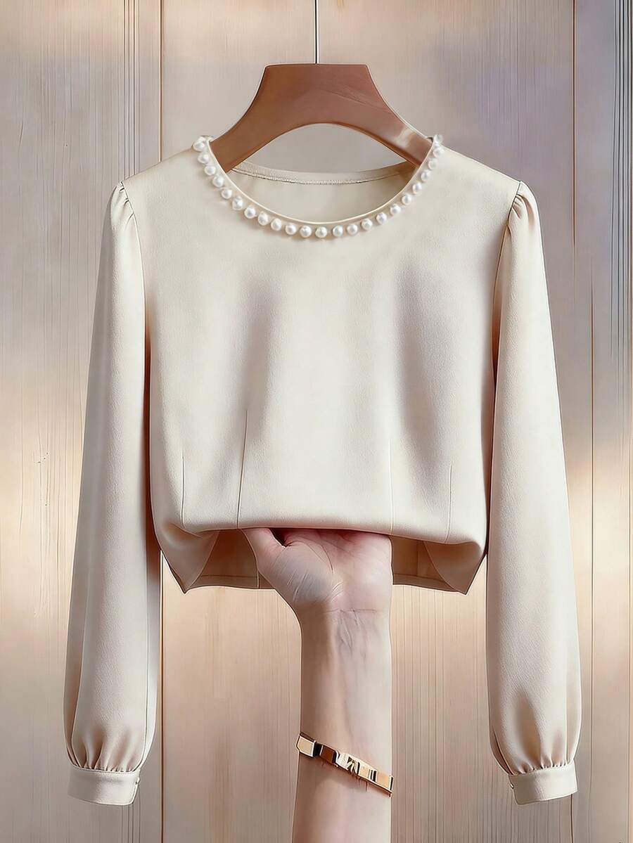 Franclia Nouvelle blouse élégante pour femmes avec col rond français, décoration de perles, manches bouffantes, ajustée avec fermeture éclair au dos, coupe courte, couleur unie pour le bureau - Nude - Voir 1