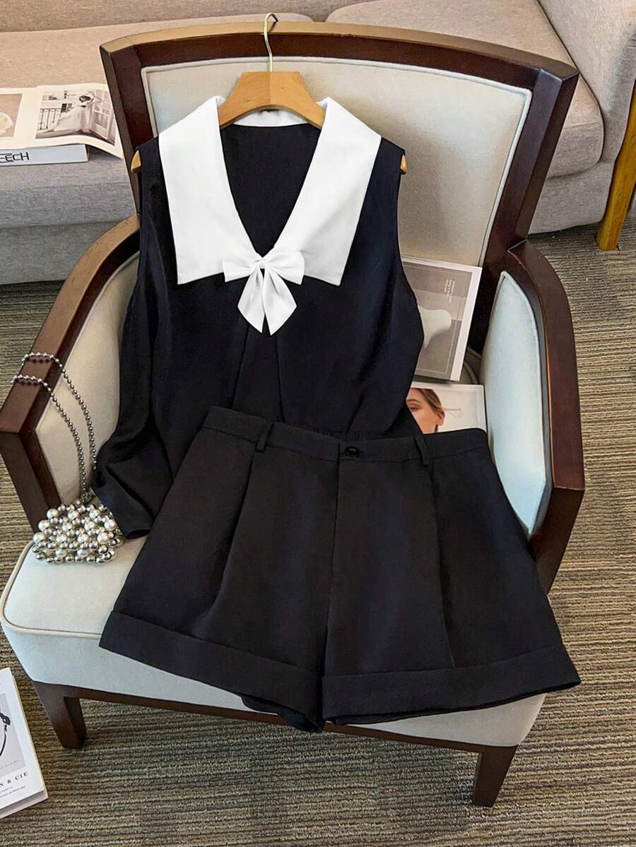 GlowEve CURVE Plus Size Women's Sleeveless Black & White Contrast Pleated Elegant Bow Decor Top + Elastic Waist Loose Shorts 2 Piece Set, Suitable For Spring Commuting And Outings - Black - View 1