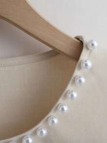 Franclia Nouvelle blouse élégante pour femmes avec col rond français, décoration de perles, manches bouffantes, ajustée avec fermeture éclair au dos, coupe courte, couleur unie pour le bureau - Nude - Voir 6