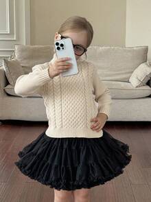 SHEIN Emery Rose Kids 女童纯色麻花针织高领毛衣，秋冬季，高领长袖针织毛衣，女童休闲不对称下摆套头衫，柔软保暖，适合冬季穿着，可爱复古，适合圣诞节，非常适合秋冬季休闲日常穿着和上学穿着，温暖舒适的长袖，非常适合休闲日常穿着和上学穿着，适合家庭度假穿着。 - 米色 - 查看 8