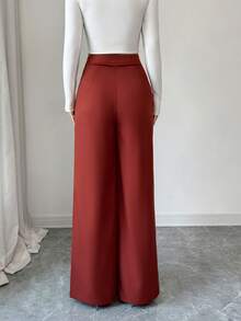 Elenzga Pantalones casuales versátiles de estilo bohemio occidental de cintura alta en color marrón óxido, con diseño de tejido trenzado, hebilla metálica cruzada asimétrica, cremallera lateral y pierna recta, adecuados para mujeres de 20 a 35+ años para uso diario, primavera y otoño - Óxido marrón - Ver 2