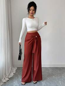 Elenzga Pantalones casuales versátiles de estilo bohemio occidental de cintura alta en color marrón óxido, con diseño de tejido trenzado, hebilla metálica cruzada asimétrica, cremallera lateral y pierna recta, adecuados para mujeres de 20 a 35+ años para uso diario, primavera y otoño - Óxido marrón - Ver 4