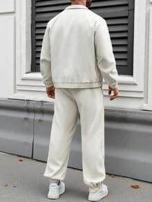 Manfinity CasualCool Bộ đồ nam màu trơn tay dài, áo khoác có túi trước khóa kéo và quần ống rộng có dây rút ở eo, kiểu dáng thường ngày, bộ hai mảnh thường ngày cho nam, bộ đồ màu kem cho nam, bộ đồ vải lanh hai mảnh cho nam, bộ đồ phối hợp nam, bộ đồ vải lanh nam, bộ đồ đi bộ màu be cho nam, bộ đồ nam hai mảnh ngắn kèm áo khoác, phong cách cổ điển, thích hợp cho mặc hàng ngày, đi chơi cuối tuần, hoạt động ngoài trời, du lịch, môi trường làm việc thoải mái hoặc các dịp bán trang trọng, quà tặng cho bạn trai/chồng, quà kỷ niệm/sinh nhật, quà Giáng sinh/Năm mới. - Màu be - Xem 2