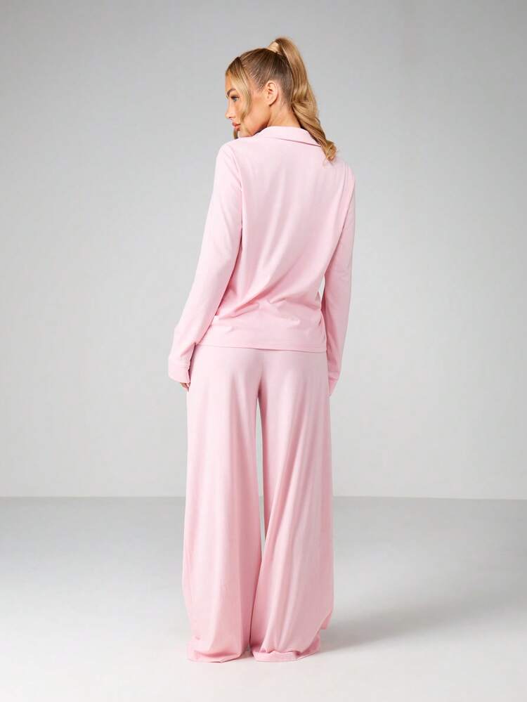 Missguided x Playboy Ensemble pyjama boutonné brodé avec pantalon à jambes larges