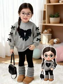 两件套女婴简约时尚黑色蝴蝶结印花圆领卫衣（袖口饰有蝴蝶结）搭配黑色拼接打底裤，秋冬装