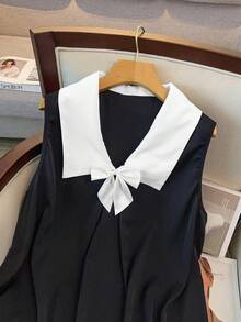 GlowEve CURVE Plus Size Women's Sleeveless Black & White Contrast Pleated Elegant Bow Decor Top + Elastic Waist Loose Shorts 2 Piece Set, Suitable For Spring Commuting And Outings - Black - View 4