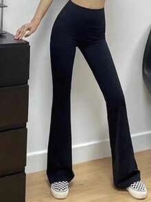 1 par de pantalones joggers acampanados de cintura alta para mujer, con bolsillos laterales y silueta bootcut, diseñados como pantalones informales. - Negro - Ver 5