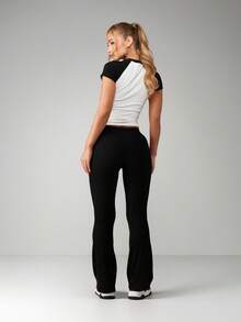 Missguided x Playboy Script Print Raglan Sleeve Crop Top And High Waisted Flare Pants Two Piece Co Ord Set - Black and White - View 2