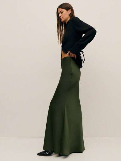 Nöista Elegant Satin Maxi Skirt With A Smooth, Flowing Silhouette. Perfect For Spring Break Outfits And Elegant Celebrations, Versatile For Pairing With Sweaters Or Blouses For An Elevated, Festive Look.