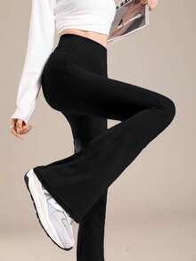 1 par de pantalones joggers acampanados de cintura alta para mujer, con bolsillos laterales y silueta bootcut, diseñados como pantalones informales. - Negro - Ver 6
