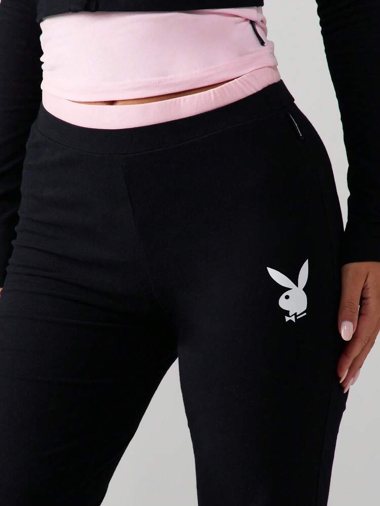 Missguided x Playboy Set coordinato da pigiama in maglia a costine, con top corto con bottoni e maniche lunghe, e pantaloni a vita alta a zampa d'elefante, comodo abbigliamento da relax