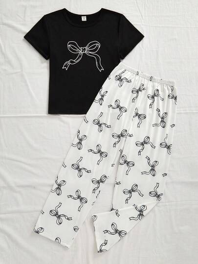 Tween flickors pyjamas - 2 delar sommarpyjamasset svartvitt rosetttryck kortärmat rund hals topp långbyxor matchande set lätt mjukt bekvämt sött snyggt lounge nattkläder hemkläder högtid 2026 oumbärlig present