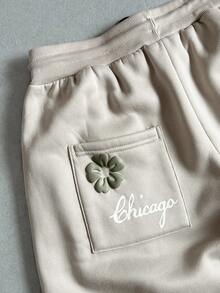 Manfinity ZONE917 男士字母与花卉印花抽绳腰袋阔腿宽松休闲运动裤，男士花裤，男士宽松运动裤，男士奶油色慢跑裤，带花慢跑裤，带花运动裤，2000 年代风格 - 卡其色 - 查看 2