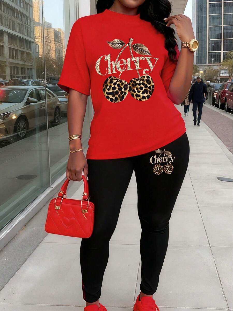 SHEIN Bộ áo thun tay ngắn cổ tròn đơn giản và quần legging thời trang thường ngày sáng tạo, tươi mới họa tiết da báo dành cho nữ, họa tiết quả anh đào, khẩu hiệu chữ in phong cách thường ngày, thoải mái, phù hợp mọi mùa - Nhiều màu - Xem 1