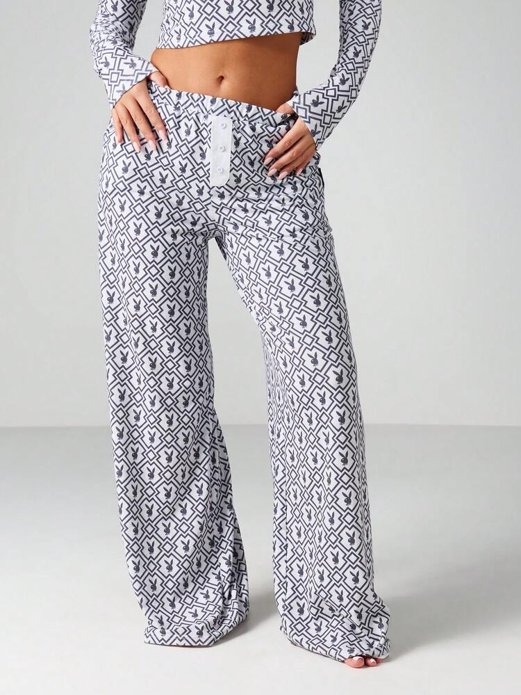 Missguided x Playboy Printed Long Sleeve Crop Top And Wide Leg Trouser Two Piece Lounge Set With Monogram Pattern For Loungewear And Casual Wear