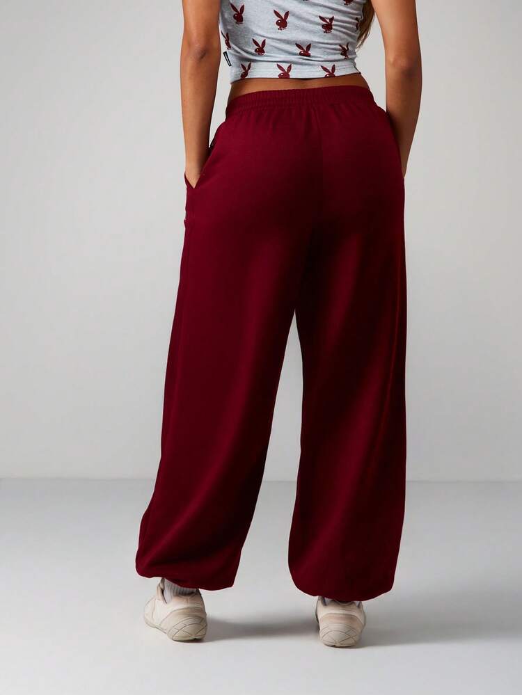 Missguided x Playboy Oversized Cuffed Jogger Sweatpants With Side Pockets And Drawstring Waistband For Casual Loungewear And Everyday Comfort