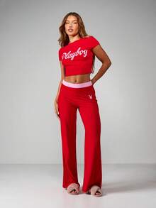 Missguided x Playboy Conjunto de pijama con top corto y pantalón de pierna ancha con detalle de cintura rosa - Multicolor - Ver 1