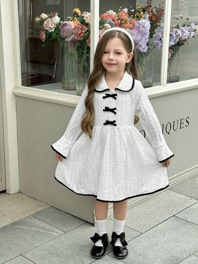 Elladie kids 年轻女孩甜美、可爱、优雅的学院风喇叭长袖领黑色蝴蝶结装饰休闲简约白色连衣裙