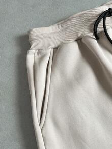 Manfinity ZONE917 男士字母与花卉印花抽绳腰袋阔腿宽松休闲运动裤，男士花裤，男士宽松运动裤，男士奶油色慢跑裤，带花慢跑裤，带花运动裤，2000 年代风格 - 卡其色 - 查看 6