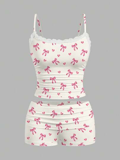 SHEIN Essnce Y2K ชุดลำลองวินเทจน่ารักเซ็กซี่อเนกประสงค์สำหรับปาร์ตี้สนามบิน, ลายพิมพ์โบว์หัวใจสีชมพู, เสื้อกล้ามลูกไม้ใส่สบายและกางเกงขาสั้นพลีท ชุด 2 ชิ้น, เหมาะสำหรับฤดูใบไม้ร่วง/ฤดูหนาว