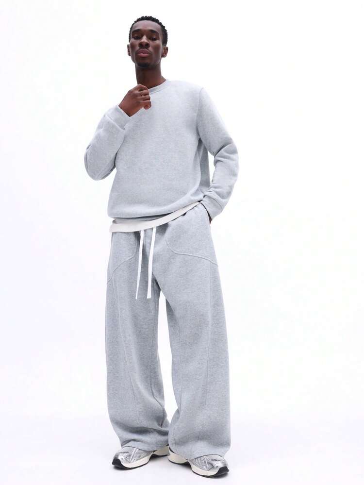 杢グレーのクルーネックスウェットシャツ