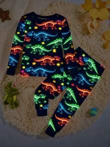 Snug Fit Young Boys Pajamas-2 Piece Pajama Set Navy Neon Dinosaur Print Round Neck Long Sleeve Top Long Pants Sleepwear Cozy Stretchy Elastic Waist Four Season 2026 New Year Holiday Essential Bedtime Gift Playful Cartoon Glow Nighttime Comfortable This Product Requires UV Light Exposure To Glow