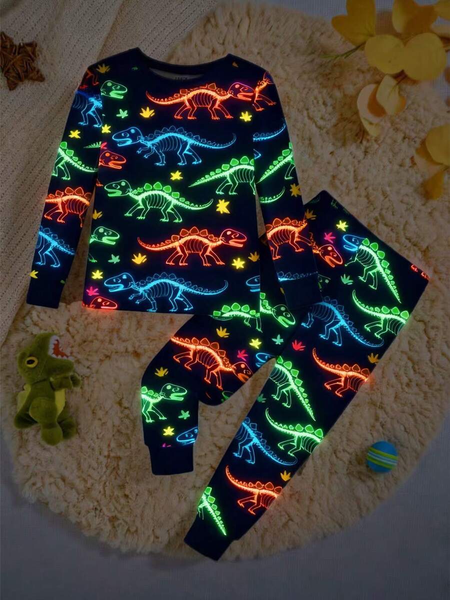 Snug Fit Young Boys Pajamas-2 Piece Pajama Set Navy Neon Dinosaur Print Round Neck Long Sleeve Top Long Pants Sleepwear Cozy Stretchy Elastic Waist Four Season 2026 New Year Holiday Essential Bedtime Gift Playful Cartoon Glow Nighttime Comfortable This Product Requires UV Light Exposure To Glow
