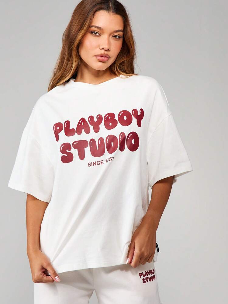 Missguided x Playboy T-shirt à manches courtes en mélange de coton avec imprimé graphique surdimensionné et texte, col rond