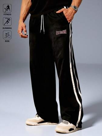 Manfinity Sport Polished Pantalones deportivos para hombres con rayas de contraste y estampado de letras