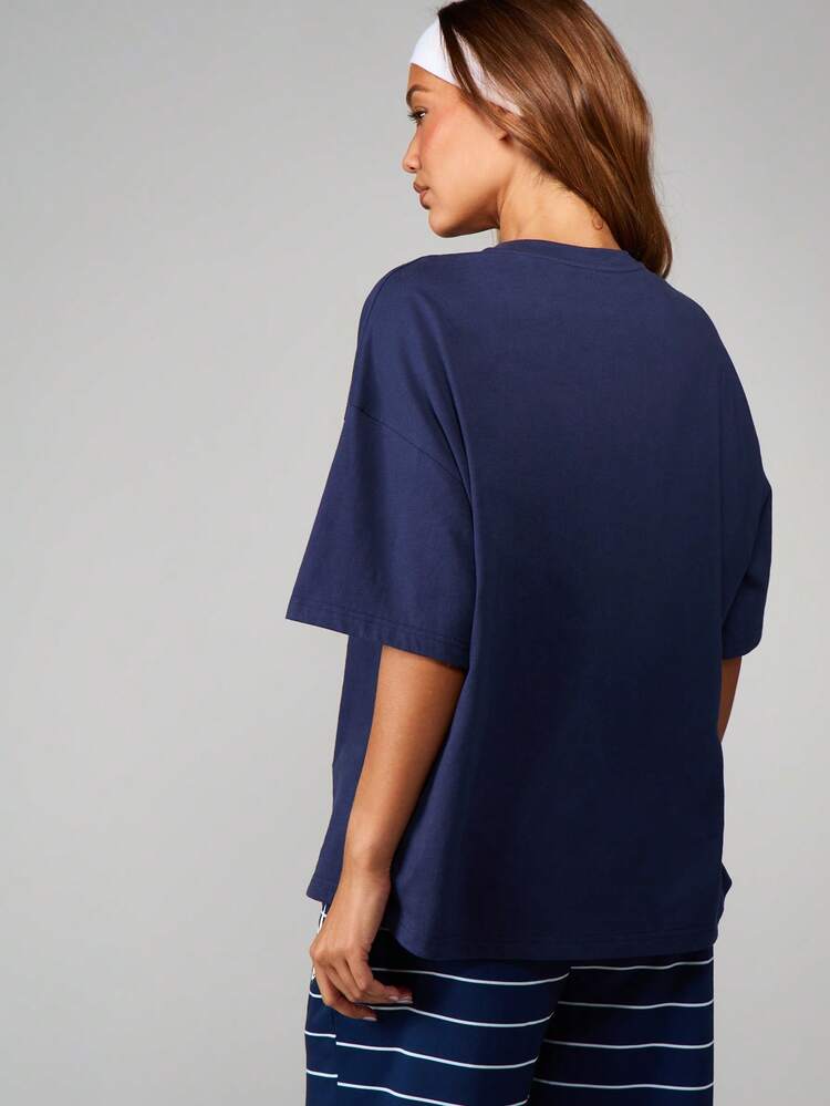 Missguided x Playboy Oversized Navy Short Sleeve Crew Neck Graphic Tee With Athletic Chest Print Logo Design Casual Streetwear
