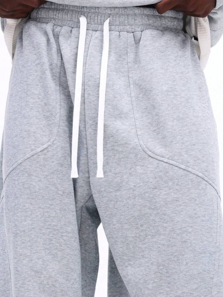 サイドポケット付きヘザードローストリングスウェットパンツ