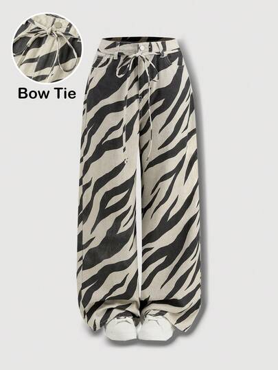 SHEIN MOD Calça jeans feminina casual de perna larga com estampa de zebra e bolsos.