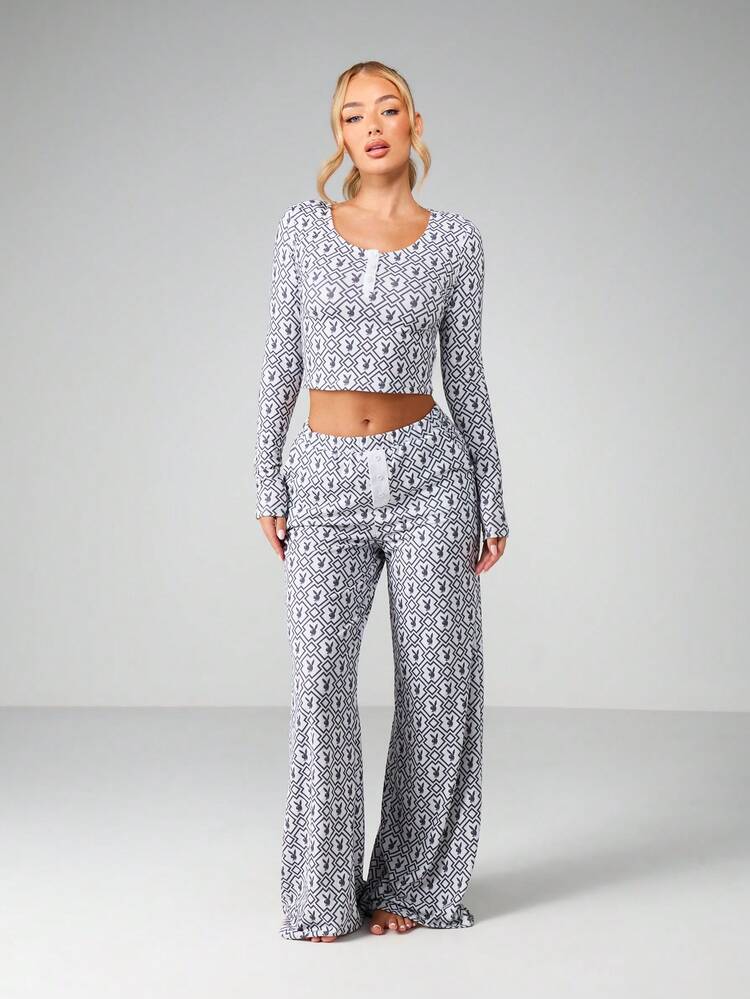 Missguided x Playboy Printed Long Sleeve Crop Top And Wide Leg Trouser Two Piece Lounge Set With Monogram Pattern For Loungewear And Casual Wear