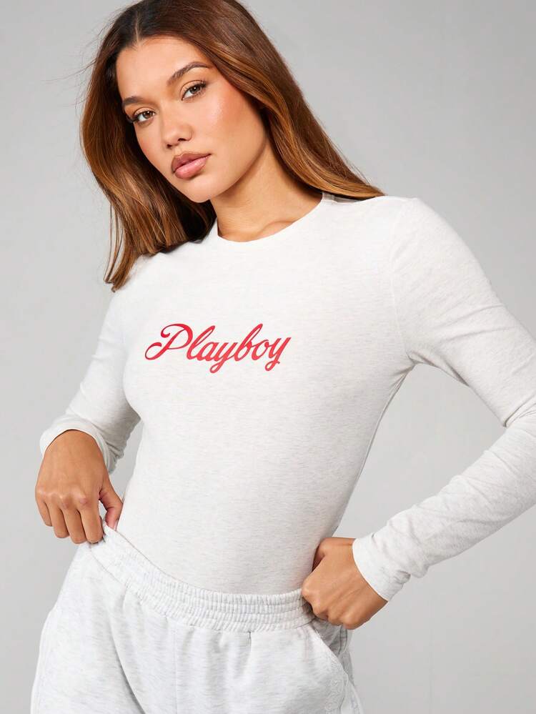 Missguided x Playboy Body z długim rękawem, okrągłym dekoltem i nadrukiem z logo na klatce piersiowej. Klasyczny jednoczęściowy top z mieszanki bawełny. Na co dzień. Niezbędny.