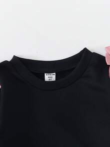 Sweetra 2件套年轻女孩简约时尚粉色蝴蝶结黑色上衣和粉色裤子运动服套装 - 查看 4