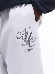 SUMWON Pantalón de chándal con logo impreso, cintura con cordón, puños elásticos y bolsillos laterales para un uso casual cómodo - Gris - Ver 7