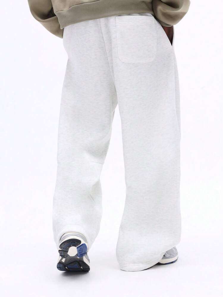 Pantaloni della tuta grigio mélange con coulisse e polsini