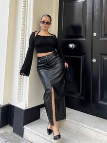 NegzBox Chân váy dài đến đùi xẻ cạp cao bằng da PU màu trơn - màu đen - Xem 1