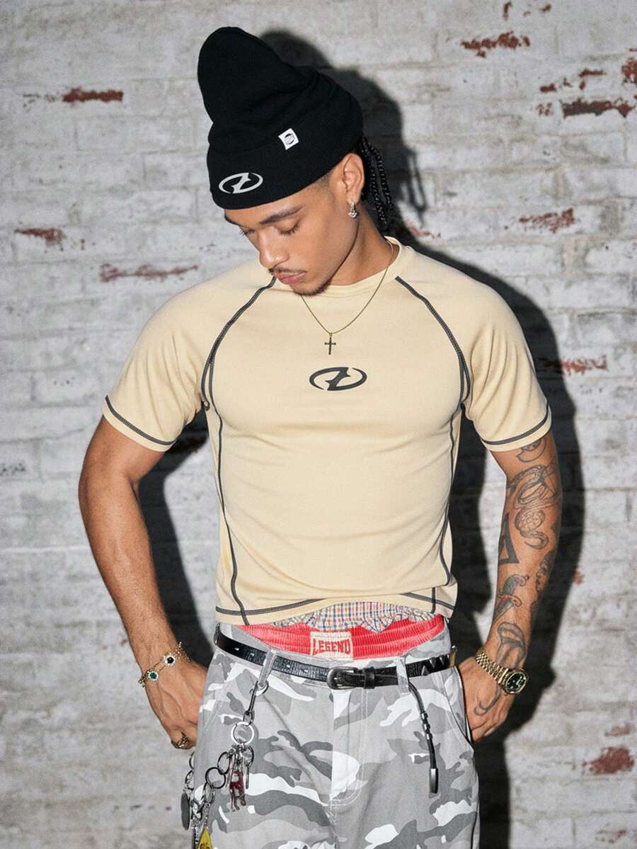 AXEPEAK Camiseta de manga corta casual con estampado y costuras de contraste para hombres - Albaricoque - Ver 1