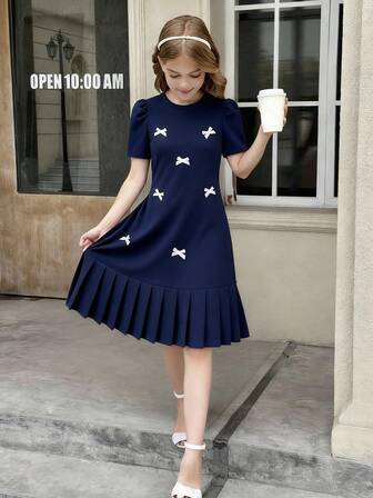 1 pieza Vestido plisado de manga corta con decoración de lazo 3D para niñas preadolescentes, corte holgado, para primavera/verano, vacaciones, verano, viajes