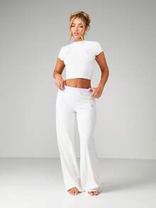 Missguided x Playboy Bộ đồ ngủ nữ tay ngắn crop top và quần ống rộng in hình thỏ hồng - trắng - Xem 1