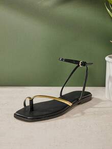 SHUZIA #UrbanLuxe Women's Electroplated Gold TPU Strap Black Ankle Wrap Ring Toe Flat Sandals – Elegant, Minimalist & Luxurious Everyday Style. - Black - View 3