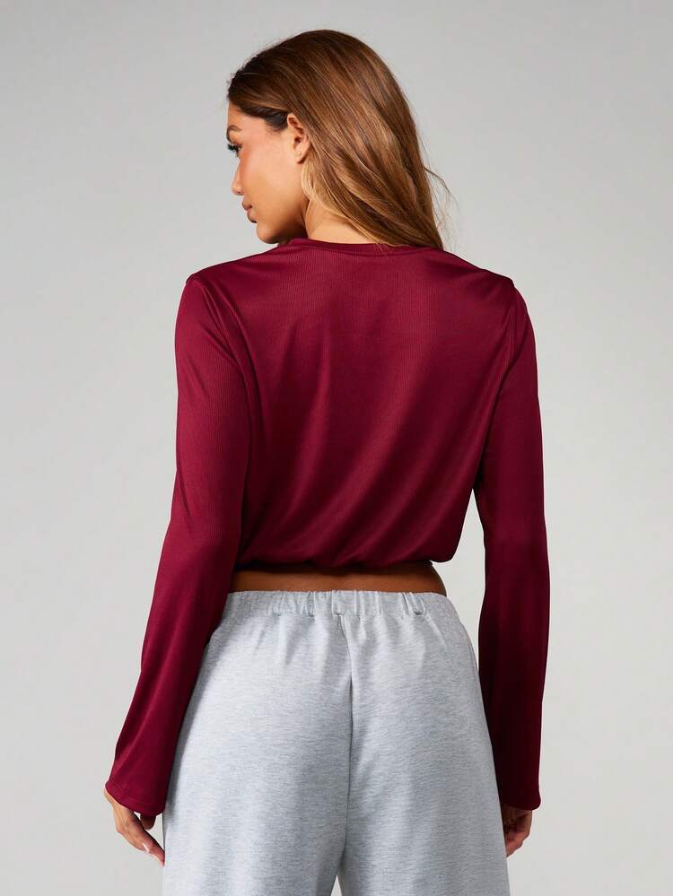 MISSGUIDED Oversized Ribbed Long Sleeve Henley Top With Button Front Detail And Cinched Waist Hem