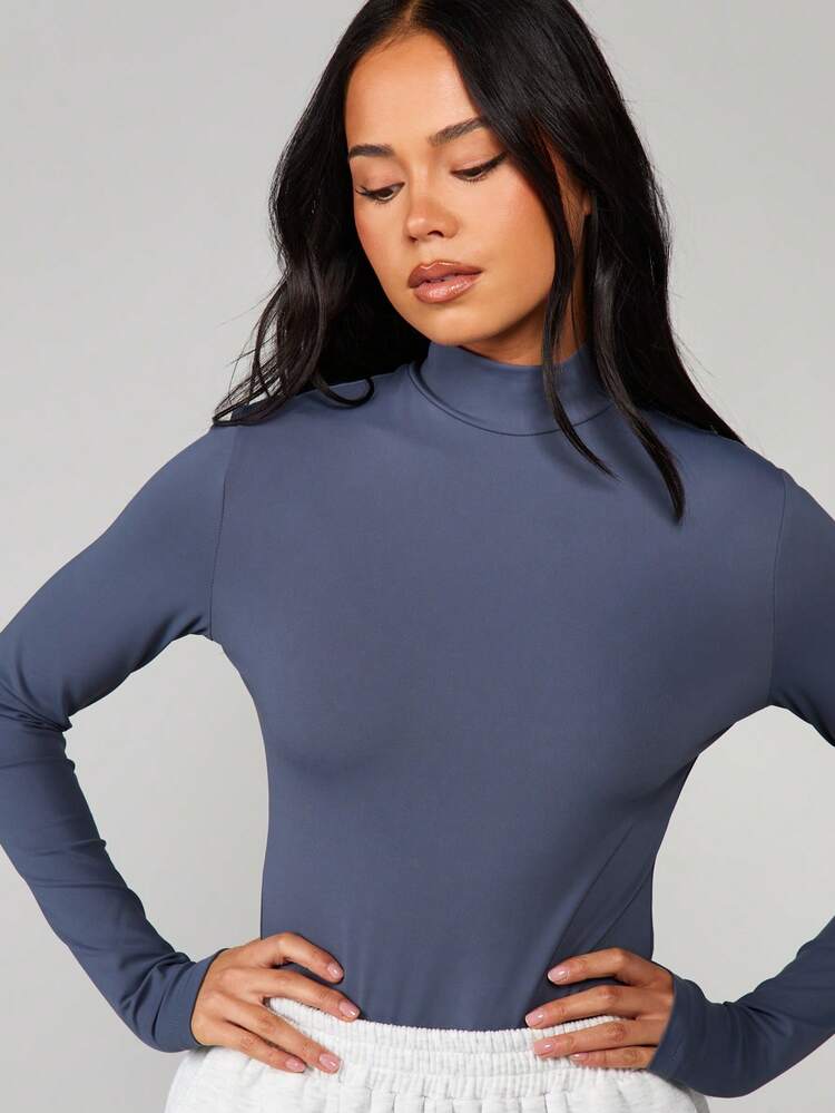 MISSGUIDED Funnel Neck Long Sleeve Bodysuit Classic Fitted Turtleneck Top Form Fitting One Piece Essential Layering Basic Wardrobe Staple