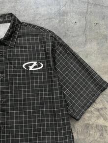 AXEPEAK Áo sơ mi dệt tay ngắn họa tiết kẻ caro và chữ dáng rộng cho nam - Xám - Xem 6
