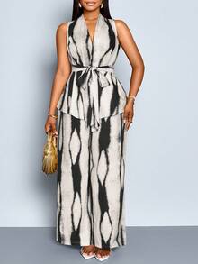 SOLERSUN Bộ đồ hai mảnh áo không tay và quần dài dáng rộng dành cho nữ cỡ lớn, áo in họa tiết mới với dây rút eo và quần không tay (họa tiết ngẫu nhiên), trang phục đơn giản cho mọi mùa, quần ống rộng thoải mái, thích hợp mặc hàng ngày, đi làm, du lịch, nghỉ mát biển, bộ đồ nghỉ dưỡng sang trọng, trang phục đi làm hàng ngày, kín đáo, phong cách đảo nhiệt đới, phong cách Bohemian, trang nhã và thanh thoát, phù hợp cho mùa xuân và mùa hè. - Đen và trắng - Xem 5