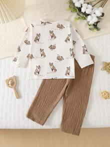 2件套男婴圆领长袖针织睡衣套装，可爱动物印花，柔软舒适，是送给男婴的绝佳礼物。 - 杏色 - 查看 2